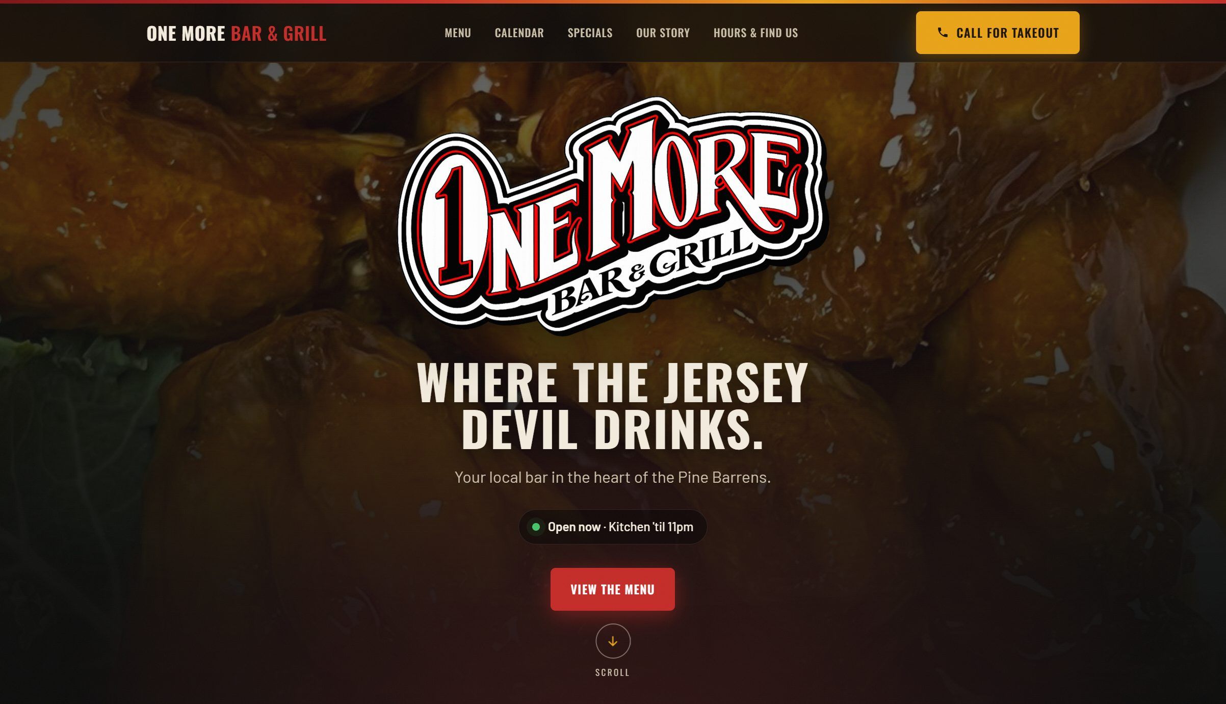 The One More Bar & Grill homepage: the bar’s logo and “Where the Jersey Devil drinks.” over a close-up photograph of sauced wings